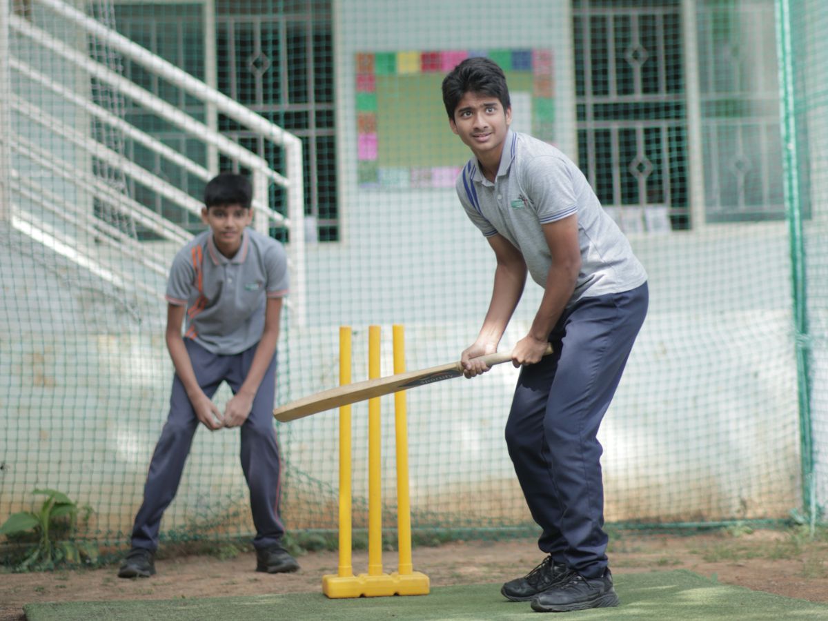 students-playing-cricket-to-manage-screen-time